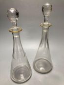 A pair of tall Bohemian cut glass decanters with faceted stoppers, unsigned, 35cmCONDITION: One