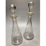 A pair of tall Bohemian cut glass decanters with faceted stoppers, unsigned, 35cmCONDITION: One