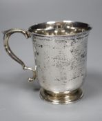 A Edwardian silver christening mug, London, 1904, 87mm, 50z.CONDITION: Maker's mark rubbed.