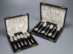 A cased set of six mid 20th century silver teaspoons and six similar coffee spoons.CONDITION: Both