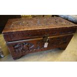 An Asian relief carved camphorwood coffer, width 73cmCONDITION: Some wear and breaks to the top with