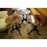 Three assorted Victorian walnut occasional tables, all reduced in height, largest diameter 53cm