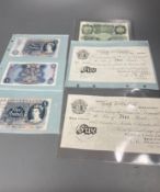 A collection of banknotes, two old £5 notes, three blue £5 notes and one green £1 noteCONDITION: All