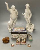 Two Crown Derby white glazed figures, 30 and 32.5cm, a group of Continental ceramics and a carved