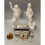 Two Crown Derby white glazed figures, 30 and 32.5cm, a group of Continental ceramics and a carved