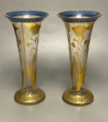 A pair of Bohemian gilt painted and blue flash cut trumpet shaped glass vases, 26cmCONDITION: Good