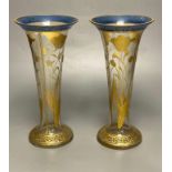 A pair of Bohemian gilt painted and blue flash cut trumpet shaped glass vases, 26cmCONDITION: Good