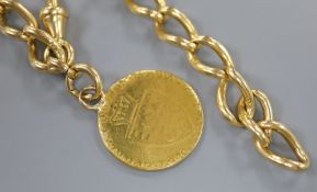 An 18ct gold curb link bracelet hung with a mounted spade guinea, bracelet 21.5cm, gross 43.5