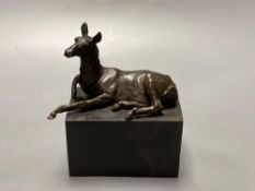 A bronze model of a recumbent mule, indistinctly signed, on marble plinth, width 12cmCONDITION: Good