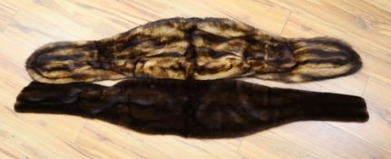 A dark brown mink stole and a dyed fox stole, 170cmCONDITION: Slightly worn, fairly good condition