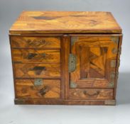 A Japanese metal mounted inlaid elm box with drawers, length 36cm