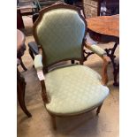 An Edwardian carved and stained beech fauteuil, width 58cmCONDITION: Frame a little wobbly,