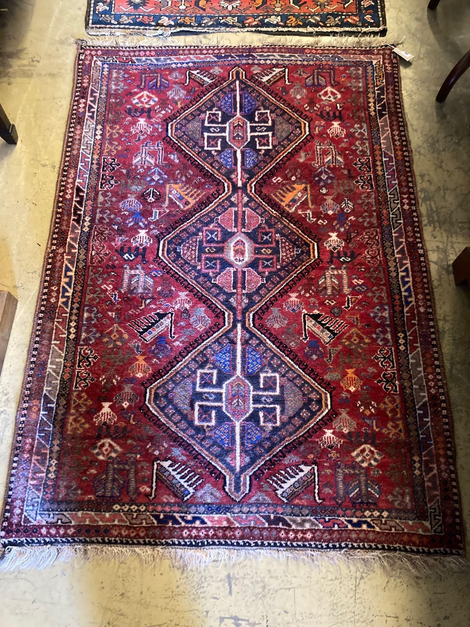 A Hamadan red ground rug, 157 x 109cmCONDITION: Good condition, some slight wear at the fringe
