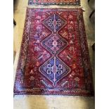 A Hamadan red ground rug, 157 x 109cmCONDITION: Good condition, some slight wear at the fringe