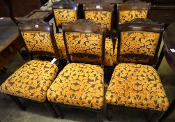 A set of six early 19th century Anglo-Indian rosewood dining chairs, with carved frames and padded