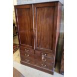 An early 19th century mahogany linen press, width 117cm height 187cmCONDITION: Lacks the original