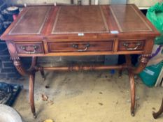 A modern yew wood and mahogany writing table, with sliding backgammon and chessboard top, width