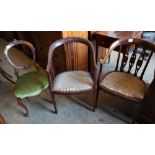 Two Edwardian inlaid mahogany tub shaped elbow chairs and a Victorian walnut salon chairCONDITION: