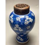 A Chinese blue and white vase, Kangxi period, wood cover, neck reduced, 18cmCONDITION: Crack