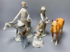 Three Lladro figures, largest 29cm, A Nao seated cherub and a Beswick horseCONDITION: Beswick
