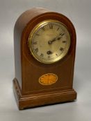 An Edwardian inlaid mahogany eight day mantel clock, with spring drive timepiece movement,