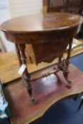 A Victorian inlaid walnut work table, with oval top, width 60cmCONDITION: Repolished at some point