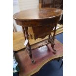 A Victorian inlaid walnut work table, with oval top, width 60cmCONDITION: Repolished at some point