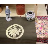A small group of Asian collectables, including a Chinese funerary figure, a Japanese Fukusa, woven