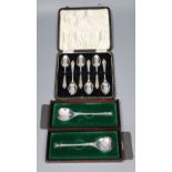 A cased set of six silver teaspoons and two single Christmas spoons