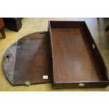 An early 19th century mahogany rectangular butler's tray, 83 x 45cm and an incomplete oval butler'