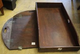 An early 19th century mahogany rectangular butler's tray, 83 x 45cm and an incomplete oval butler'