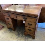A walnut kneehole dressing table/desk, incorporating antique timbers, width 95cm height