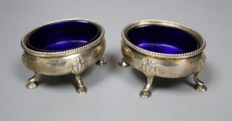 A pair of George III oval silver salts, by Hester Bateman, London 1777/8, 73mm, 151 grams, with blue