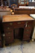 A George II mahogany kneehole desk, width 78cmCONDITION: Overall of good mid brown mahogany tone,