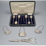 A collection of small silver to include a cased set of six coffee spoons and tongs, three modern
