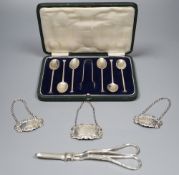 A collection of small silver to include a cased set of six coffee spoons and tongs, three modern