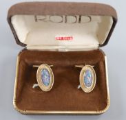 A pair of 9ct gold and opal doublet? set oval cufflinks, 24mm, gross 12.6 grams.CONDITION: A few