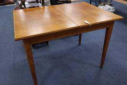 A Heals oak extending dining table, 107 x 78cmCONDITION: A little faded with wear commensurate