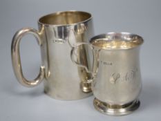 A Victorian silver christening mug, 89mm and an Edwardian silver christening mug, 76mm, gross 7.5