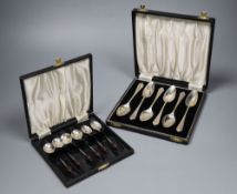 A 1930's cased set of six 'bean end' silver coffee spoons and a later set of six silver grapefruit