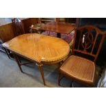 A parcel gilt satinwood centre table, width 113cm height 62cm, and a pair of Edwardian satinwood