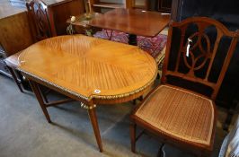 A parcel gilt satinwood centre table, width 113cm height 62cm, and a pair of Edwardian satinwood