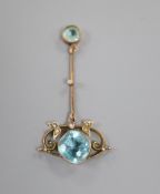 An early 20th century yellow metal, seed pearl and two stone blue topaz set drop pendant, 45mm,