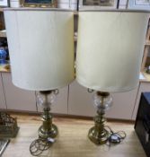 A pair of Art Nouveau style brass lamps, total height 67cmCONDITION: Both require re-wiring and