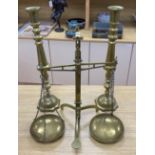 A pair of brass altar candlesticks, 60cm and a pair of Beam scales to weight 2lb, height 56cm