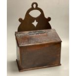 An 18th century oak candle box, cover with studded leather hinge, 28cm wideCONDITION: Good