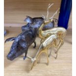 A pair of wrought iron models of pigsCONDITION: Good condition.