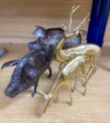 A pair of wrought iron models of pigsCONDITION: Good condition.