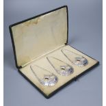 A cased set of three silver wine labels by Daniel & John Welby, London, 1911, 5cm, 29 grams, of