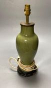 A Chinese green celadon baluster vase, adapted as a table lamp, total height excluding the top